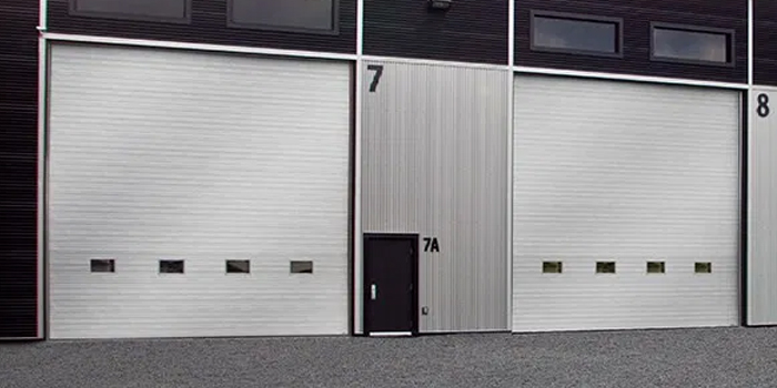 fix bent garage door in Antrim