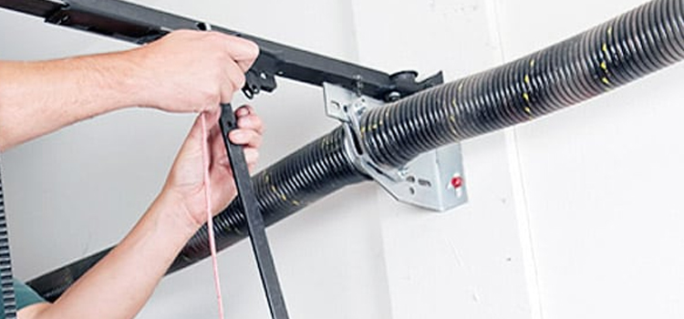 Garage Door Extension Spring Repair Bel-Air